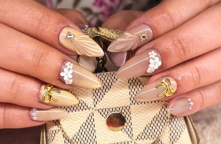 Custom handmade press-on nails with floral nail art, tailored for a perfect fit by Pressiano Nails & Company
